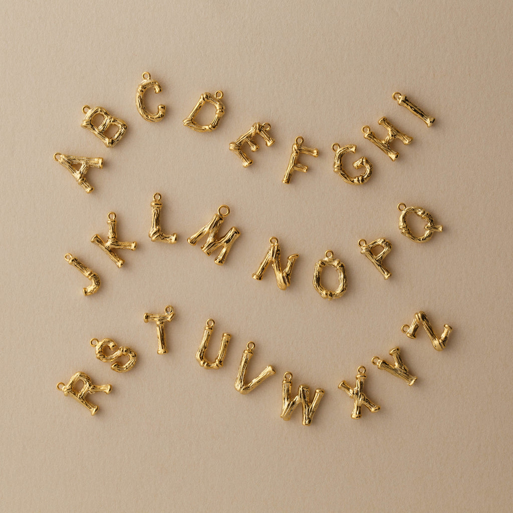gold bamboo letter charms